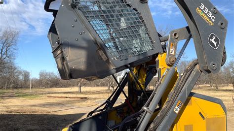 how to raise cab roof on john deere skid steer|lift john deere 333g cab.